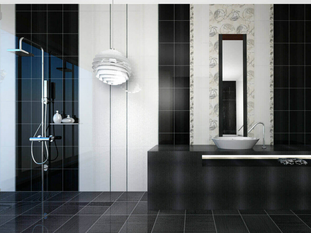 Черная плитка с белыми вставками и цветочным орнаментом в ванной комнате
